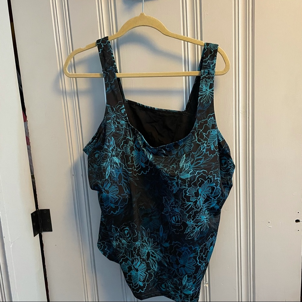 Blue and black patterned tankini with long shorts